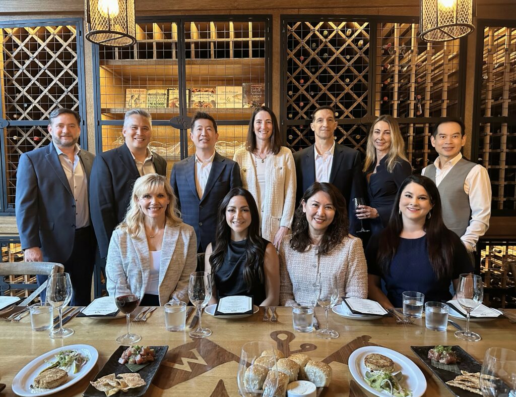 group photo of staff at dinner