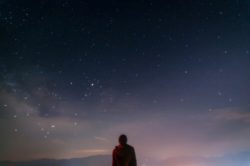 Man looking at stars