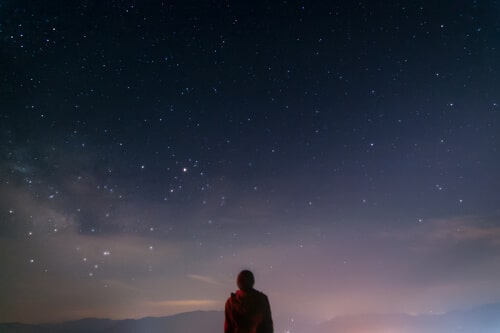 Man looking at stars now that his vision is so good from LASIK