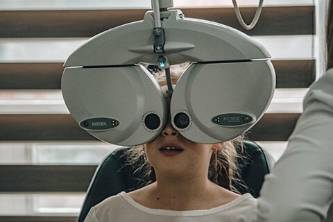 Woman getting Eye Exam