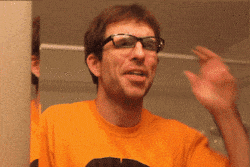 Man removing glasses animated gif