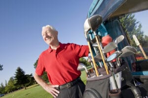 older man playing golf 