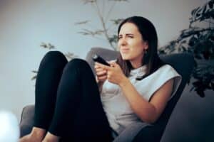 Women squinting because she has near sightedness
