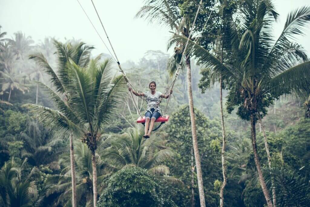 woman in tree canopy