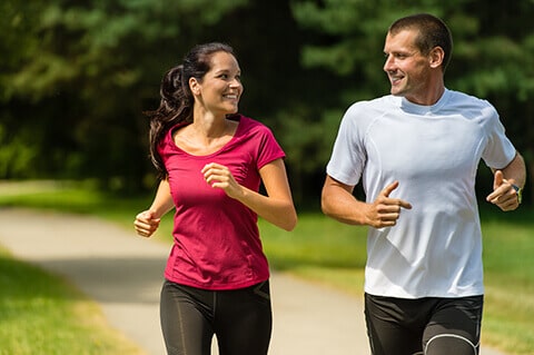 Young couple running